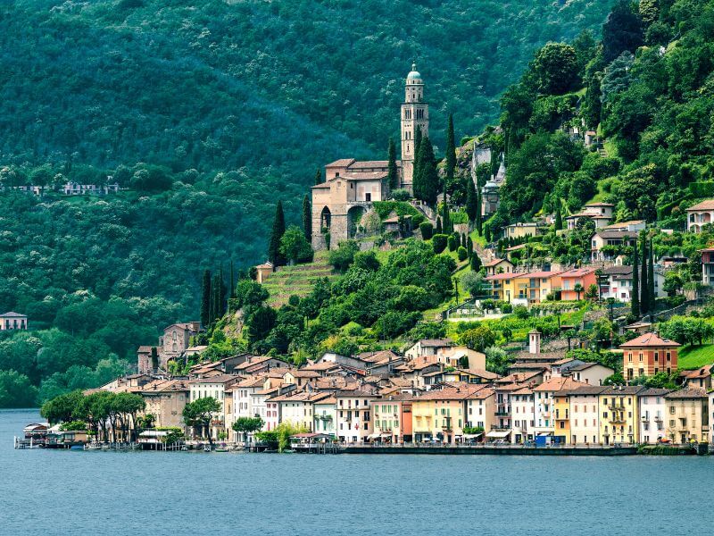 Colourful houses on the waterfront of Lake Lugano in Switzerland.