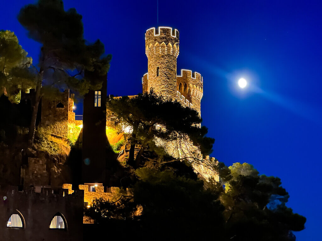 Lloret Castle at night under moonlight