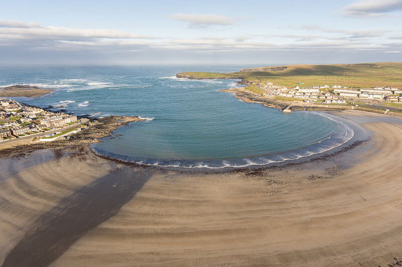 Horseshoe-shaped beach at Kilkee in County Clare Ireland.