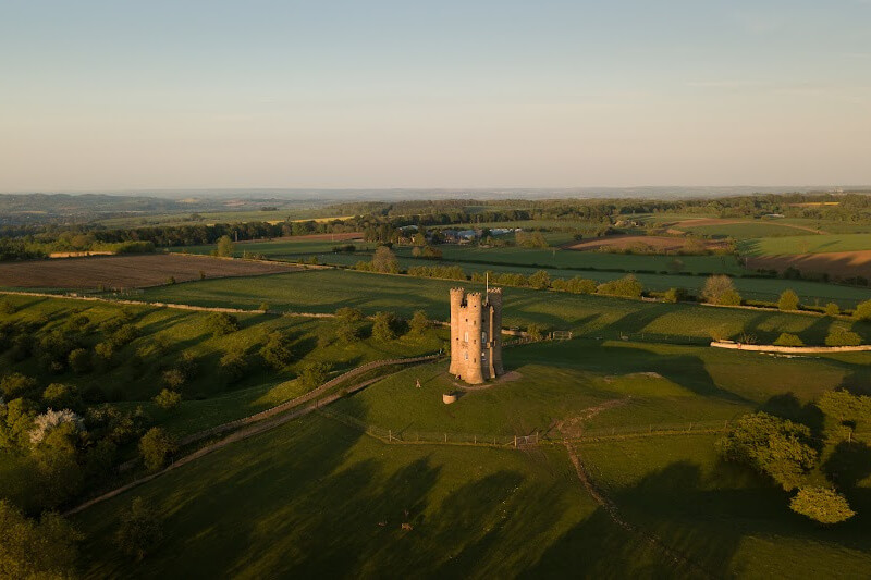 Aerial view of Broadway Tower in the Cotswolds at aunset.