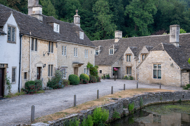 Historic architecture and cobblestone streets in a Cotswolds village.