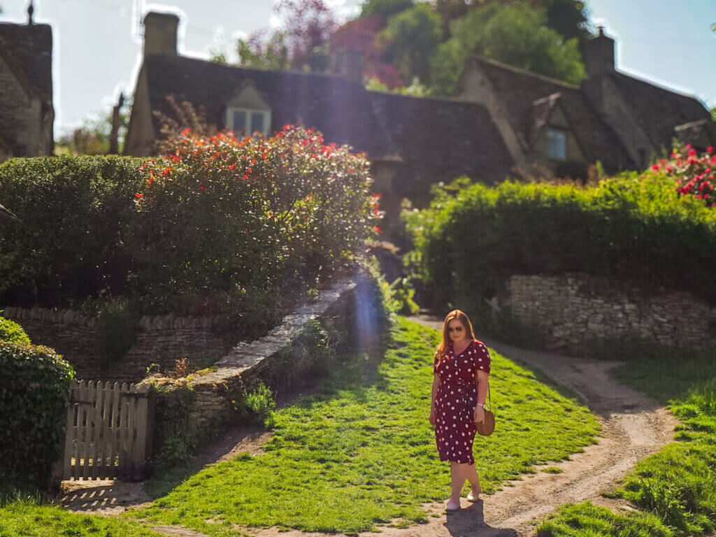 Nicola Lavin, an Irish travel blogger enjoys the sun casting a golden glow over the picturesque Cotswolds countryside.