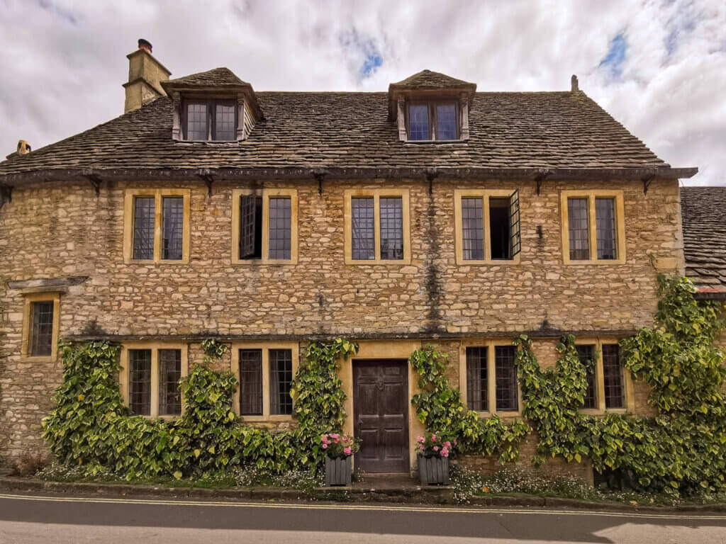 Honey-coloured stone cottage in the Cotswolds that looks like it was plucked straight out of a fairytale.