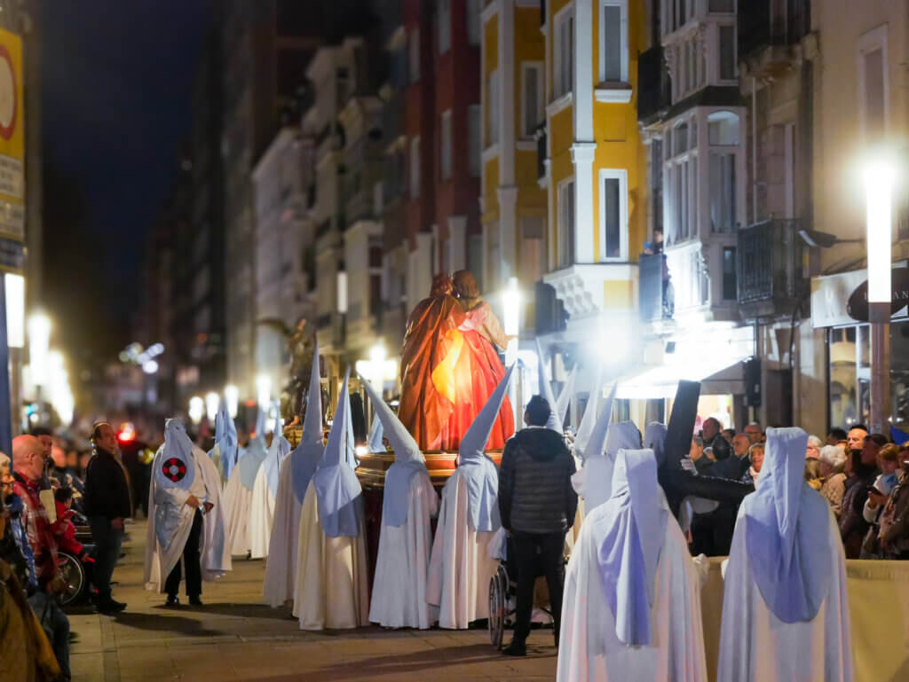 Basque Country's Semana Santa: Colorful banners and floats in Bilbao's Easter celebration.