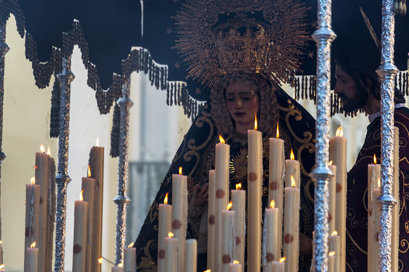 Malaga's Easter parade: Ornate floats and traditional music create a festive atmosphere.