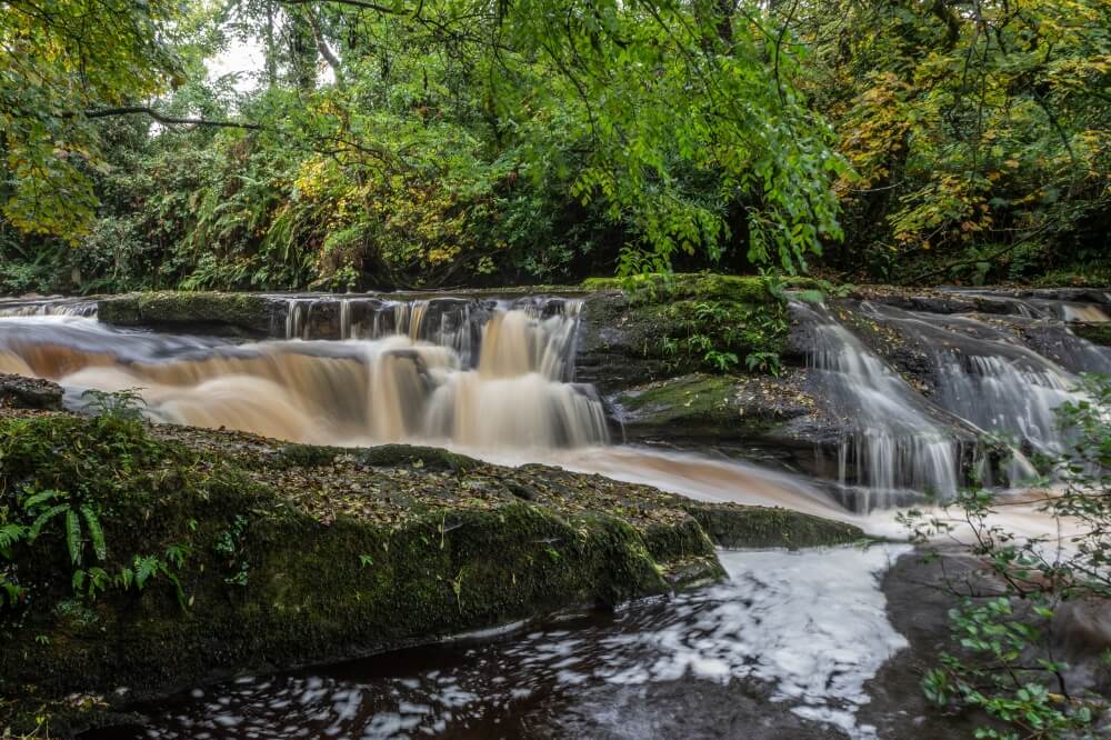 Waterfall and water pools on the Clare Glens Loop walk one of the best things to do in Tipperary.