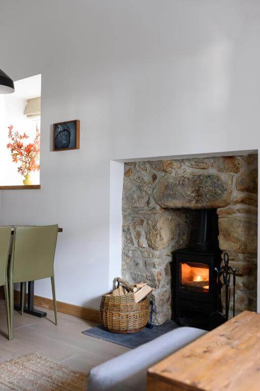 Cosy fireplace in Within the Village, Roundstone, Ireland.