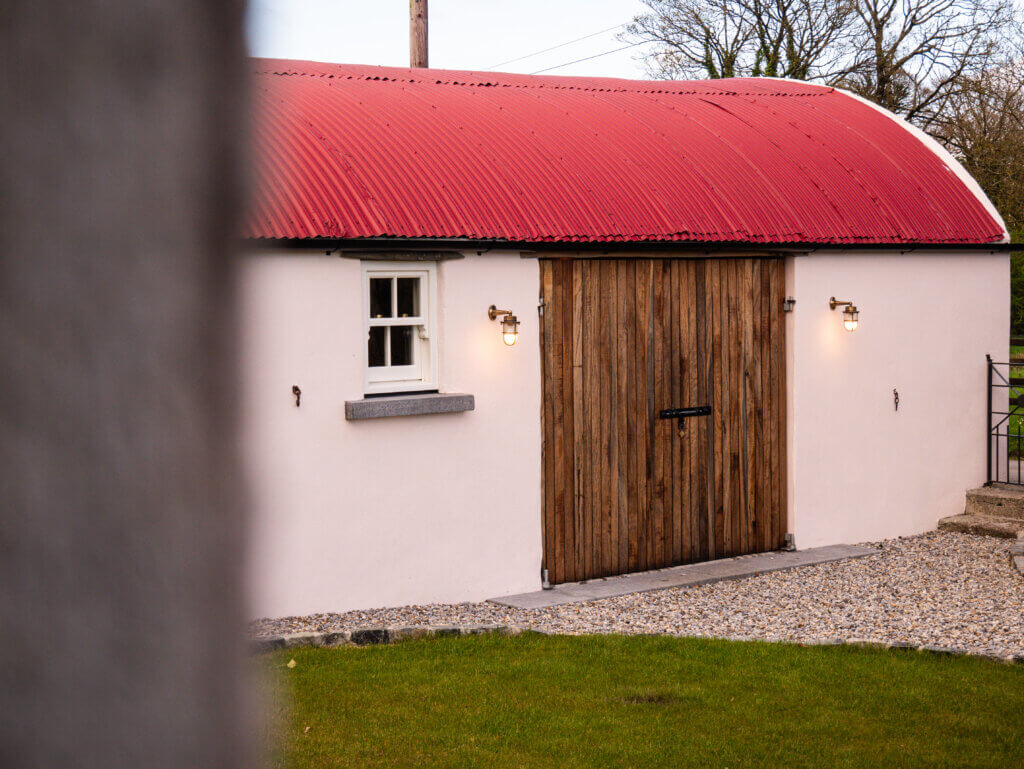 Red roof barn in Meadow View Farmhouse in Tipperary, Ireland.