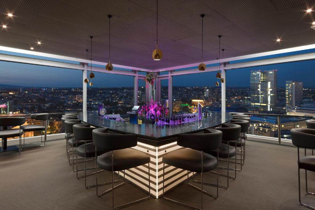 22nd Lounge and bar with views overlooking Frankfurt city at night in a boutique hotel in Frankfurt.