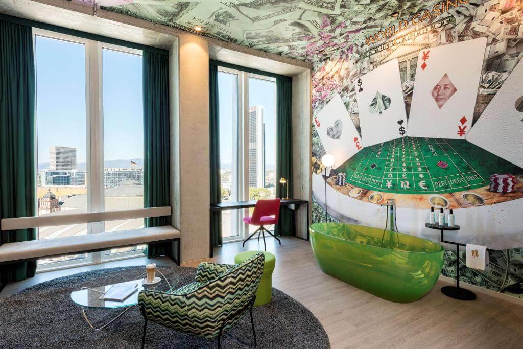 Trendy Suite with green bath at nhow Frankfurt Boutique Hotel