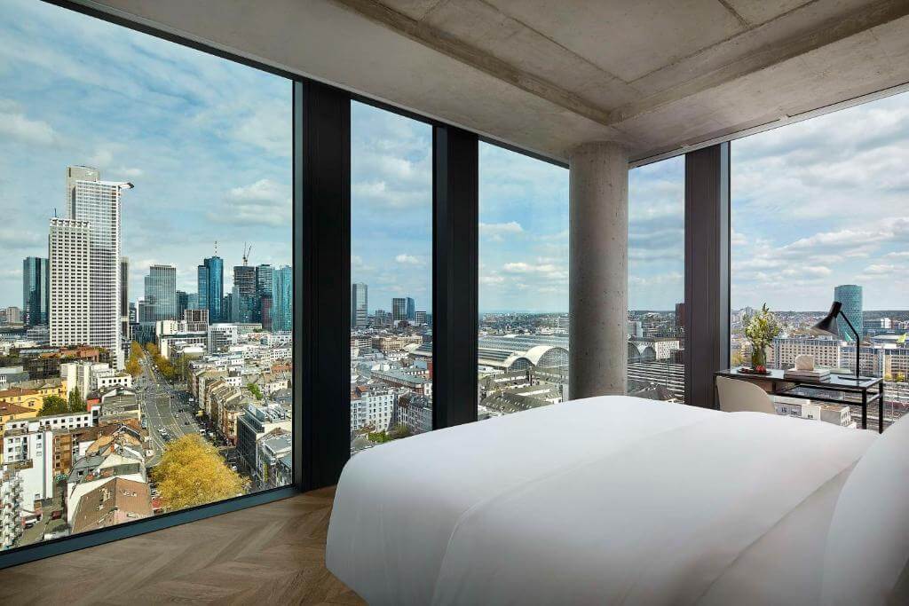 Chic and modern double bedroom with incredible city views at Hotel NH Collection Frankfurt City