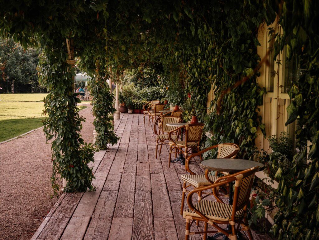 Wooden boardwalk at Brooklodge and Macreddin village in Ireland at autumn.